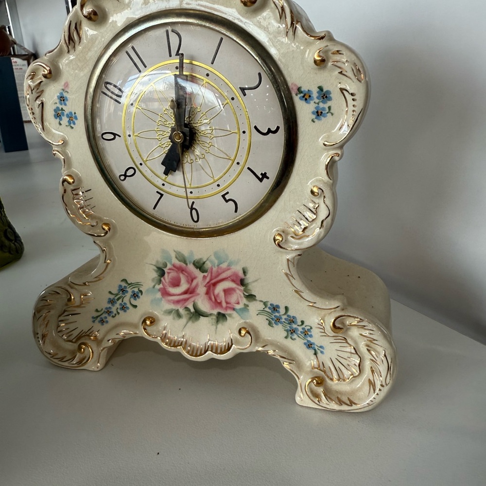 Floral Vintage-Inspired Clock with Pink and Blue Accents